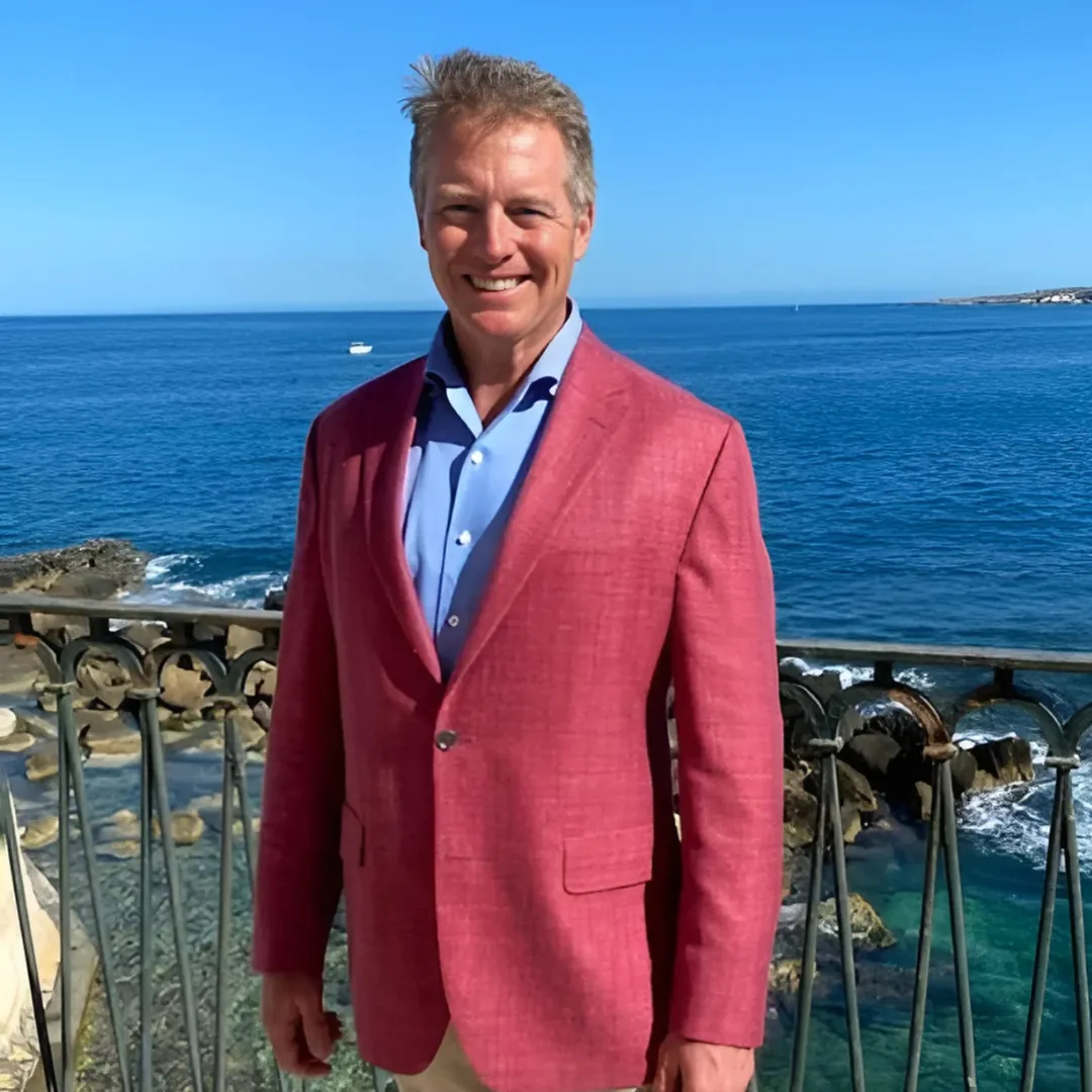 Portrait of a wine professional by the ocean